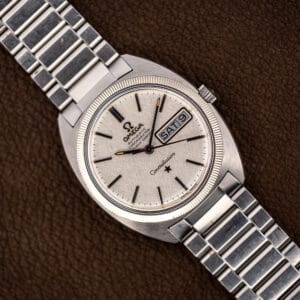 Omega Constellation 168.029 linen dial with fluted bezel and steel bracelet, day date reading SAT 9