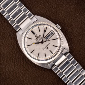 Omega Constellation 168.029 linen dial with fluted bezel and steel bracelet, day date reading SAT 9