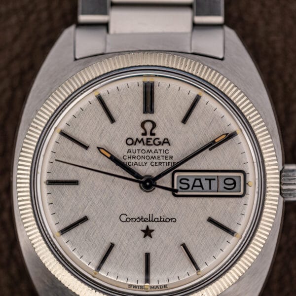 Omega Constellation cal. 751 case front with fluted bezel, linen dial and crown edge at three o'clock