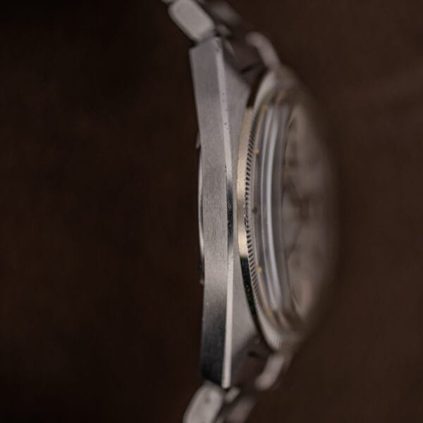 Profile of the Omega Constellation 168.029 showing case thickness, fluted bezel edge and low domed crystal