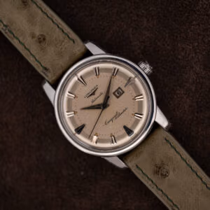 Longines Conquest Calendar 9004-3 front view, cream dial, applied arrow markers, date at three, olive strap