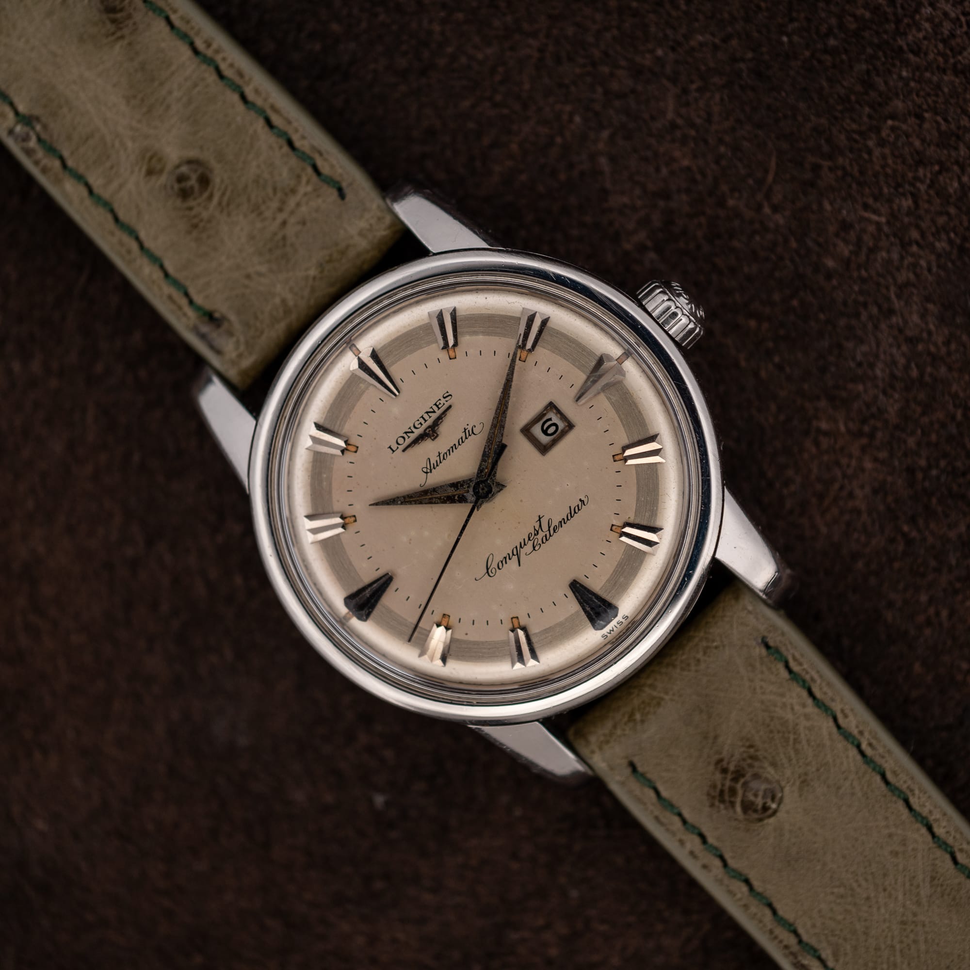 DSCF6474 Longines Conquest Calendar 9004-3 front view, cream dial, applied arrow markers, date at three, olive strap