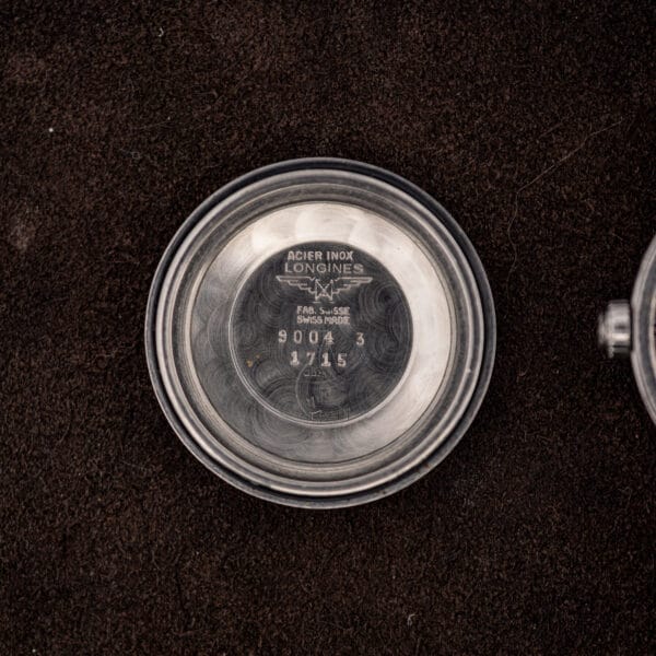 Longines caseback interior stamped Acier Inox, Fab. Suisse, Swiss Made and reference 9004 3 with service marks