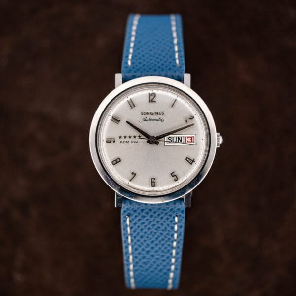 Upright catalog view of the Longines Admiral automatic, full marker layout from twelve around to the day date at three