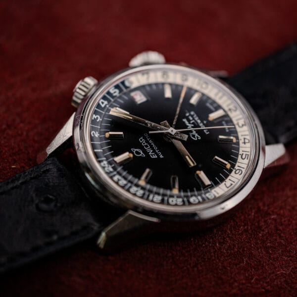 Three-quarter angle of a vintage Enicar Sherpa Jet showing honest lug wear on the Super Compressor case