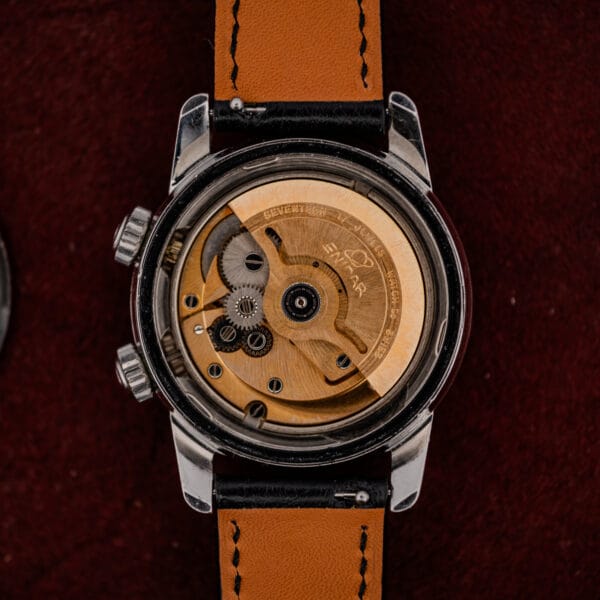 Gilt full rotor signed SEVENTEEN 17 JEWELS ENICAR WATCH Co SWISS inside this Enicar automatic movement