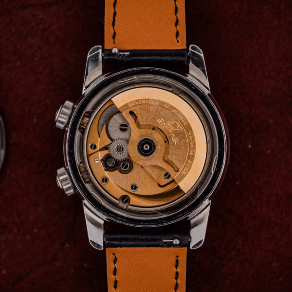 Gilt full rotor signed SEVENTEEN 17 JEWELS ENICAR WATCH Co SWISS inside this Enicar automatic movement