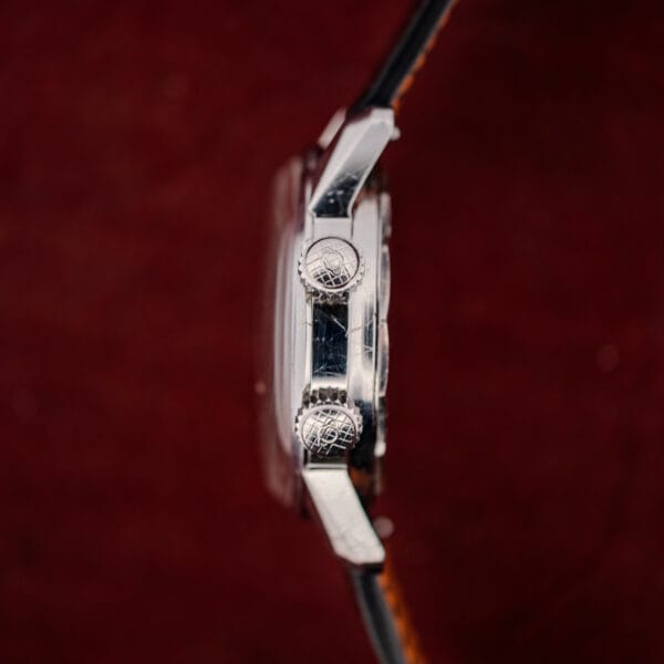 Enicar Super Compressor crowns embossed with crosshatch and diving helmet motif on the Sherpa Jet case flank