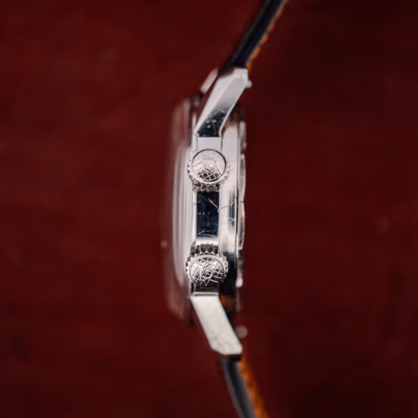 Enicar Super Compressor crowns embossed with crosshatch and diving helmet motif on the Sherpa Jet case flank