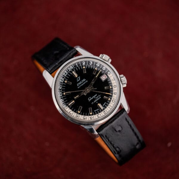 Overhead angle of an Enicar Sherpa Jet 126/002 showing steel case, domed crystal and leather strap