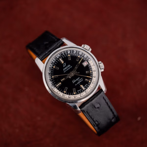Overhead angle of an Enicar Sherpa Jet 126/002 showing steel case, domed crystal and leather strap
