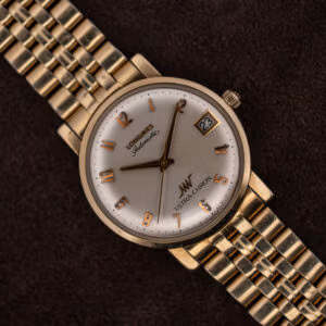 Longines Ultra-Chron automatic, silver sunburst dial with applied rose gold numerals and date at three, on gold-tone bracelet