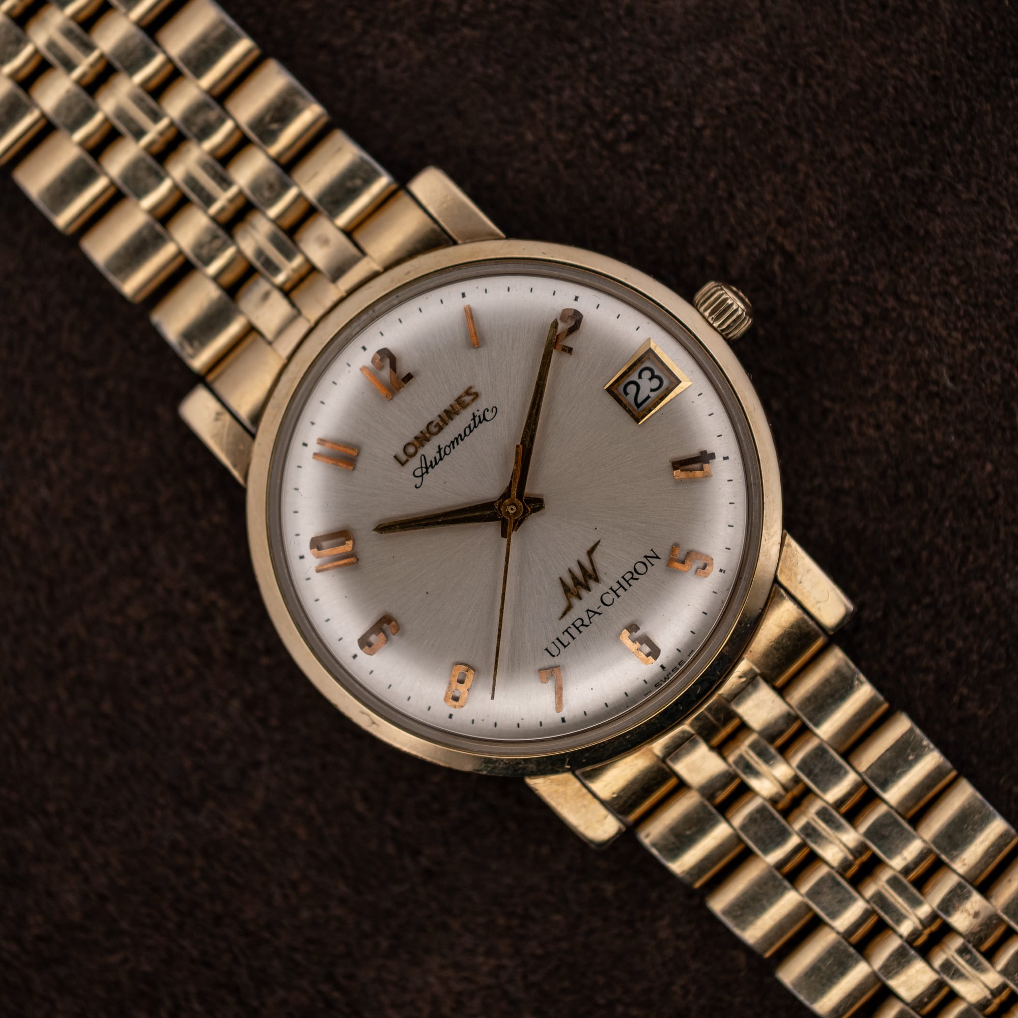 DSCF6619 Longines Ultra-Chron automatic, silver sunburst dial with applied rose gold numerals and date at three, on gold-tone bracelet