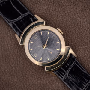 Lord Elgin Black Knight angled front view, black honeycomb dial and gold dagger markers on leather strap