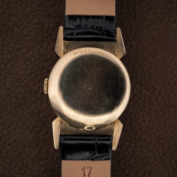 Domed caseback of the Lord Elgin Black Knight stamped 14K GOLD FILLED ROSS, scratched from decades of wear