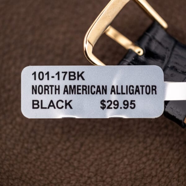 Replacement black alligator-grain strap for the Lord Elgin Black Knight with retail tag and gold-tone tang buckle