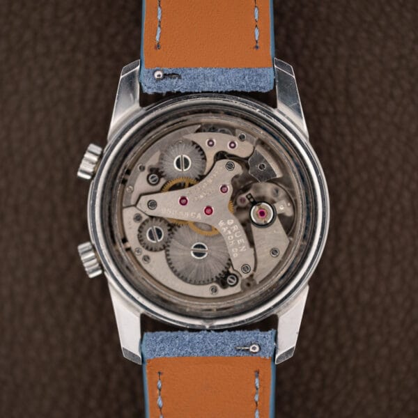 Gruen caliber 950SS CA alarm movement in place, ruby jewels beside the stainless lugs and strap underside