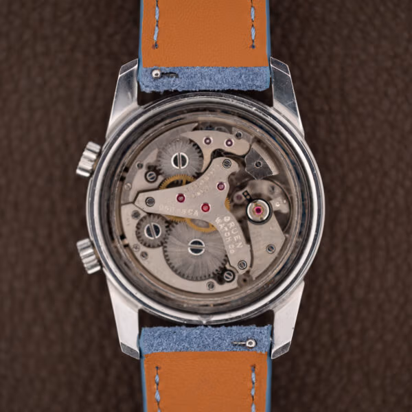 Gruen caliber 950SS CA alarm movement in place, ruby jewels beside the stainless lugs and strap underside