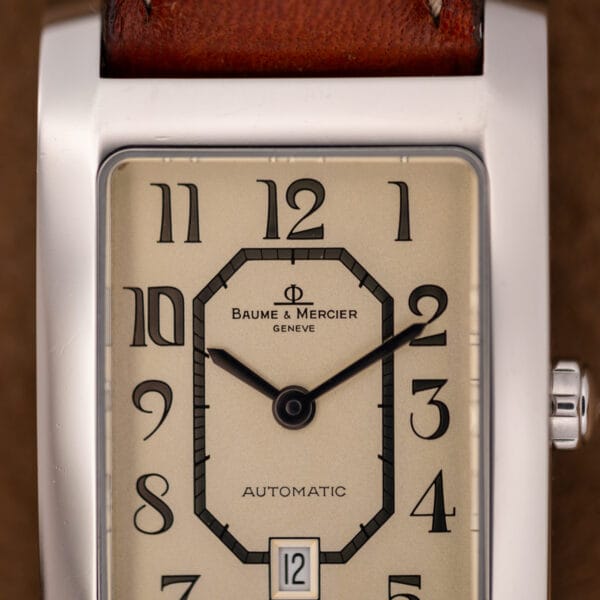 Baume & Mercier Hampton MV045120 front view with curved rectangular steel case and signed crown visible
