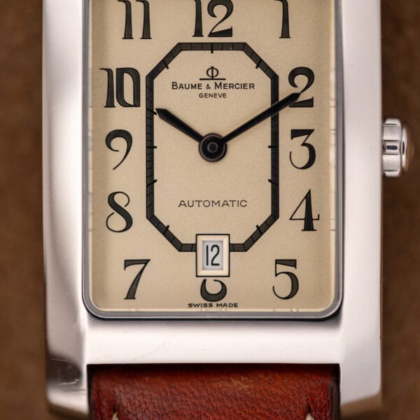 Off-white Hampton MV045120 dial reading BAUME & MERCIER GENEVE AUTOMATIC above SWISS MADE at the base