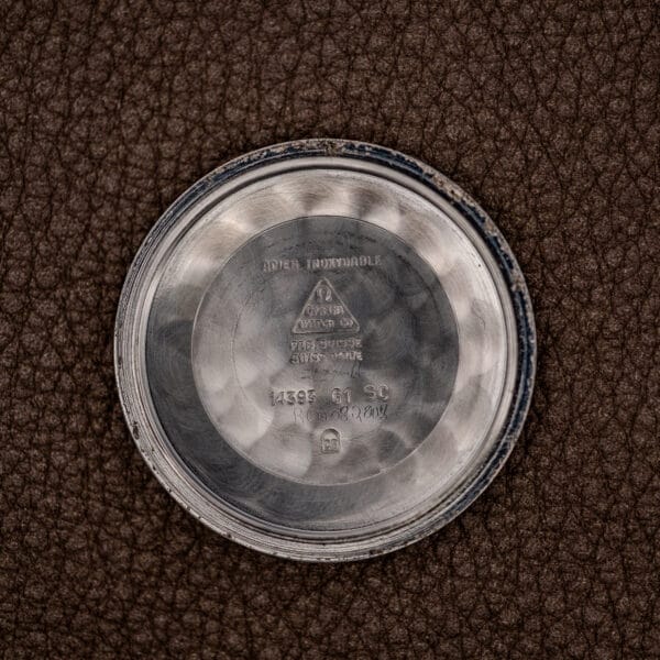 Omega Constellation inner caseback stamped 14393 61 SC with ACIER INOXYDABLE and FAB. SUISSE factory markings