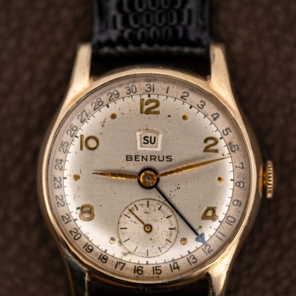 Benrus pointer date dial with outer 1 to 31 date track, SU day window and applied Arabic numerals