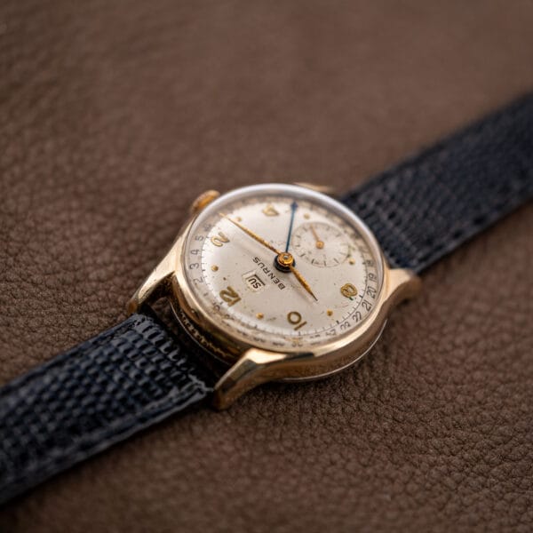 Benrus Model CE-13 dial at an angle showing the pointer date track, day window and dial patina