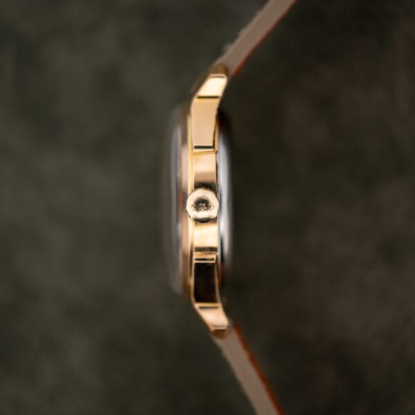 Benrus Series 7155 case profile with signed crown, slim gold electroplate flank and faceted lugs