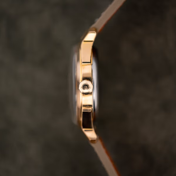 Benrus Series 7155 case profile with signed crown, slim gold electroplate flank and faceted lugs