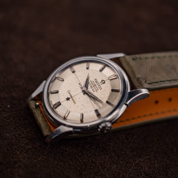 Vintage Omega Constellation on olive ostrich strap, patinated pie-pan dial with applied baton hour markers