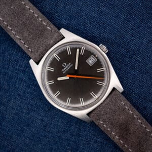 Vintage Omega Geneve 166.041 anthracite dial with orange seconds hand on anthracite suede strap
