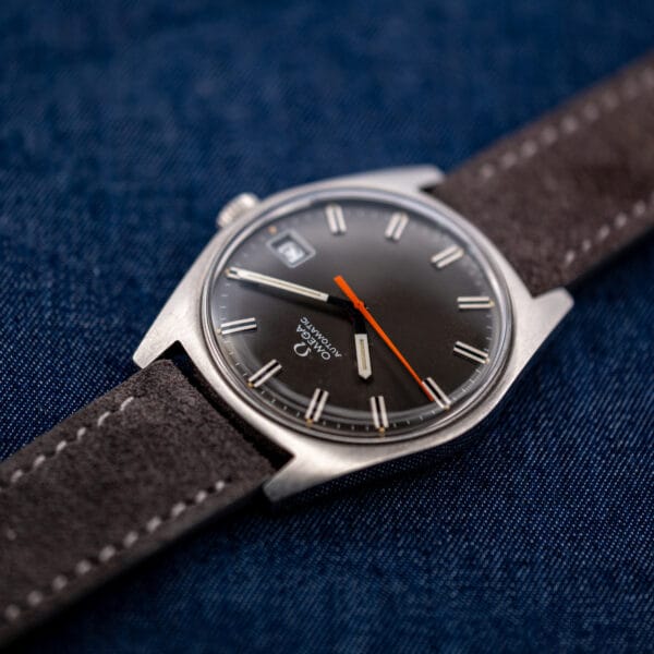 Omega Geneve 166.041 baton hour and minute hands with tritium lume inserts aged unevenly to cream