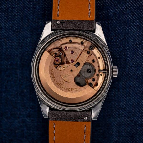 Omega caliber 563 automatic movement and rotor signed OMEGA WATCH Co SWISS inside the 166.041 case