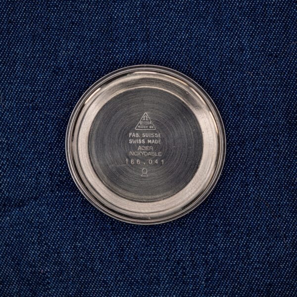 Omega 166.041 inner caseback stamped FAB. SUISSE, ACIER INOXYDABLE and the reference number 166.041