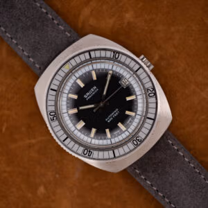 Gruen Precision Autowind 600 Feet black dial with silver bezel and date, on anthracite suede strap