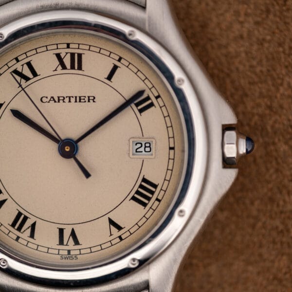 Cartier Cougar 987904 dial close-up with the secret Cartier signature hidden inside the Roman numeral VII