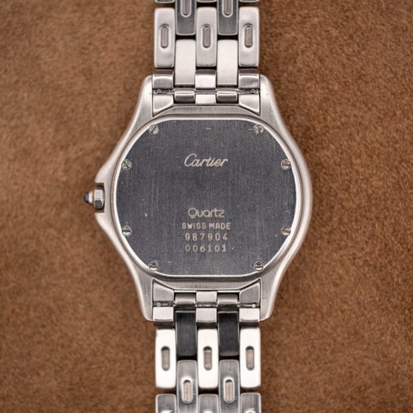 Cartier Cougar caseback engraved Cartier, Quartz, SWISS MADE, 987904 and 006101 with perimeter screws