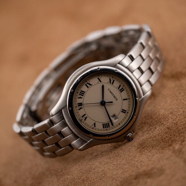 Cartier Cougar 987904 full Roman numeral dial with the Cartier name printed below the twelve