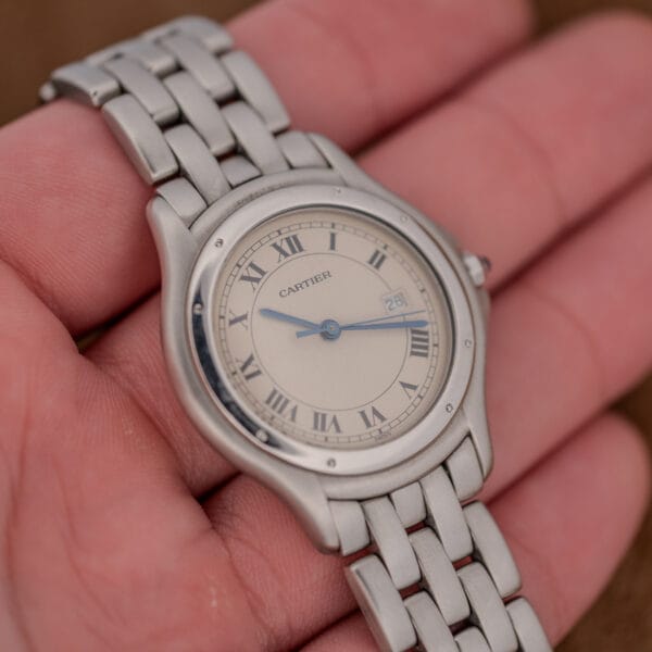 Cartier Cougar 987904 eggshell dial and blued hands, steel five-link bracelet in full frame