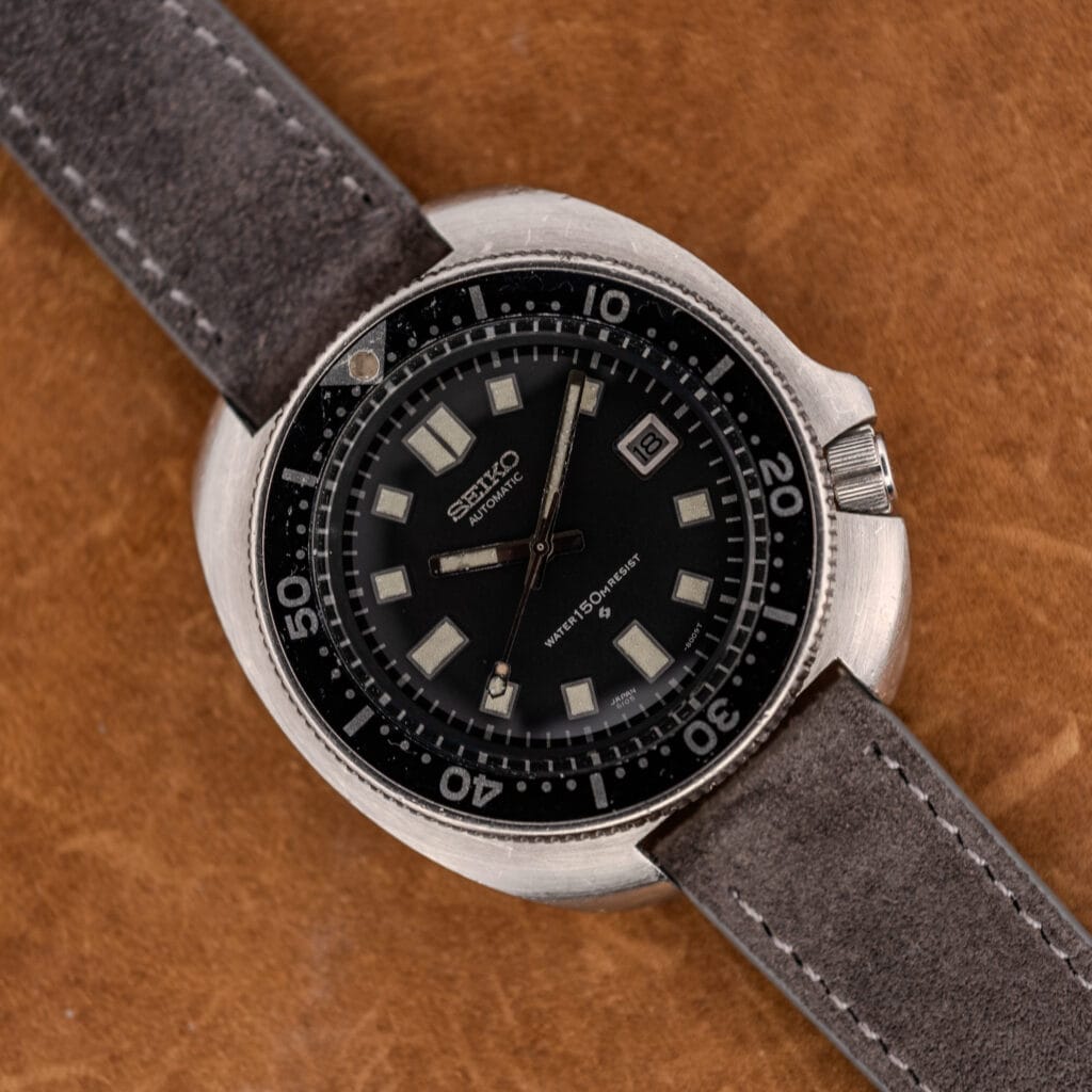 Seiko 6105-8119 Captain Willard diver, black dial and worn bezel insert, on anthracite Italian suede strap