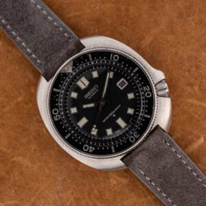 Seiko 6105-8119 Captain Willard diver, black dial and worn bezel insert, on anthracite Italian suede strap