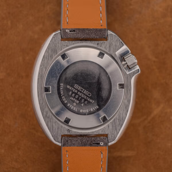 Seiko caseback engraved 6105-8119 with serial 560156, STAINLESS STEEL and WATER RESISTANT, heavily scratched