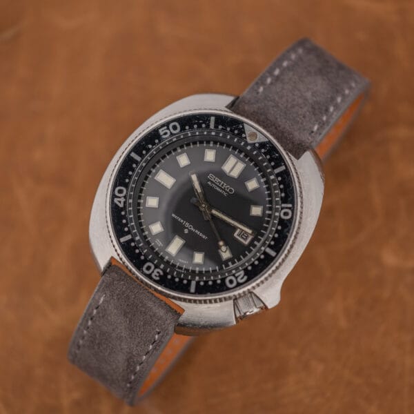 Seiko Captain Willard 6105-8119 cushion case on anthracite Italian suede strap with contrast stitching