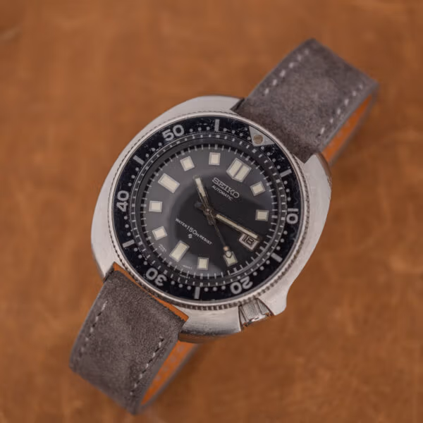 Seiko Captain Willard 6105-8119 cushion case on anthracite Italian suede strap with contrast stitching
