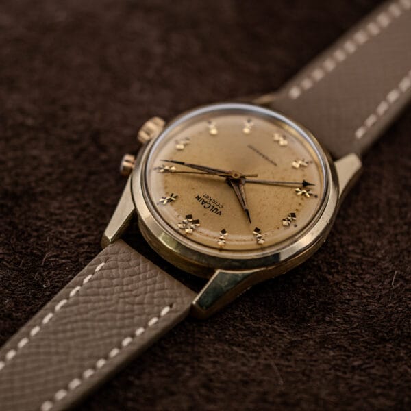 Vintage Vulcain Cricket calibre 120 alarm wristwatch, patinated dial and gold capped bezel with light wear