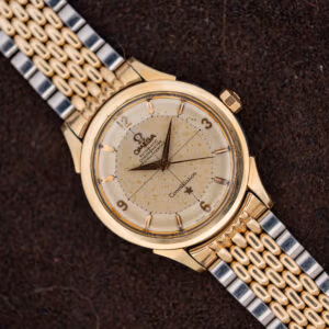 Omega Constellation 2852-9 SC pie-pan dial with heavy age spotting, gold capped case on two-tone expansion bracelet