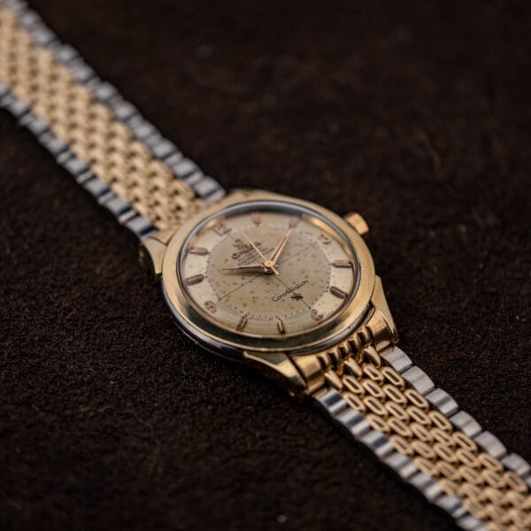 Omega Constellation cal. 505 chronometer at an angle, domed acrylic crystal over freckled vintage dial