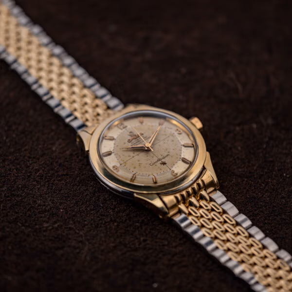 Omega Constellation cal. 505 chronometer at an angle, domed acrylic crystal over freckled vintage dial
