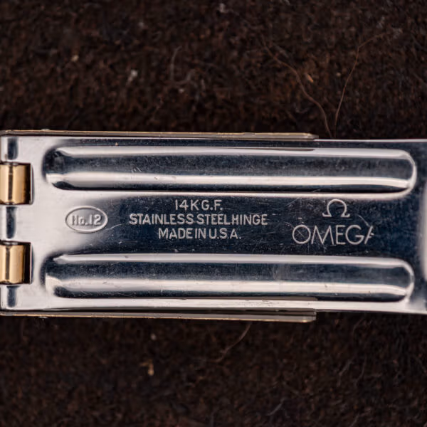 Omega bracelet clasp interior stamped OMEGA, 14KG.F., STAINLESS STEEL HINGE and MADE IN U.S.A.