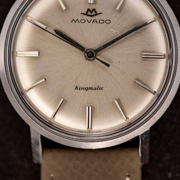 Lower dial detail of Movado Kingmatic 15161 showing Kingmatic script, paired six marker and SWITZERLAND lettering